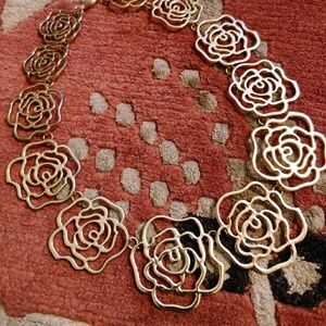 Gold tone floral necklace